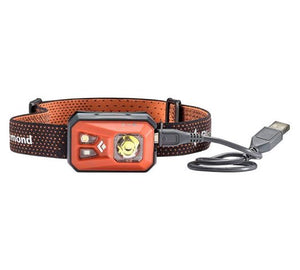 Black Diamond Revolt head torch with USB recharge cable connected