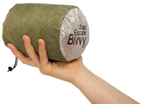 SOL Escape Bivvy held in hand to highlight compact size