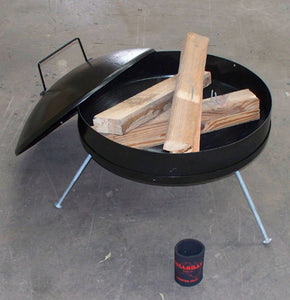 Fire pit reveals timber internally. Lid to the side.