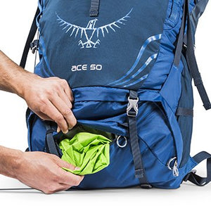Osprey Ace 38 Kids Pack with integrated waterproof cover stored at base of pack
