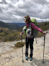 Load image into Gallery viewer, Young female hiker wearing Sea to Summit Nylon Overland Gaiters whilst hiking