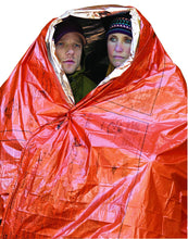 Load image into Gallery viewer, SOL Emergency Survival Blanket wrapped around 2 people